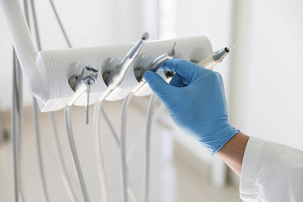 Professional Invisalign Clear Aligners technician working in Kingsford, MI